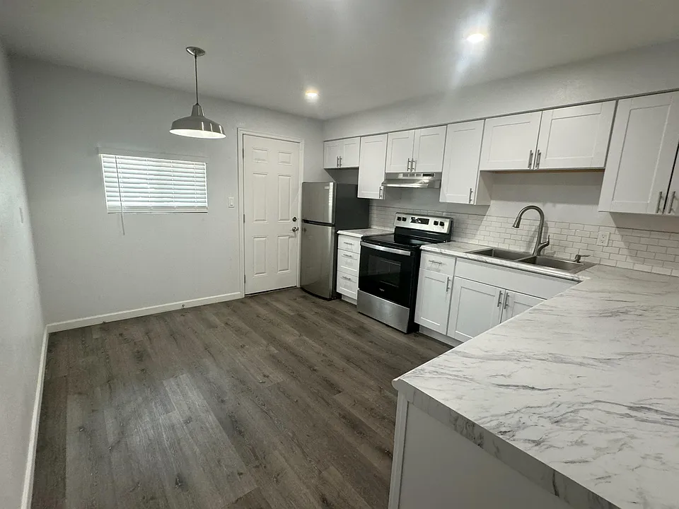 Back Door Entry and Dining Area in Kitchen.