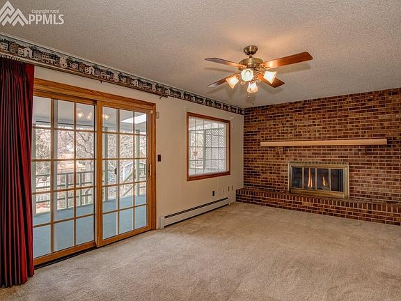 Family room With Walk Out  & Fireplace