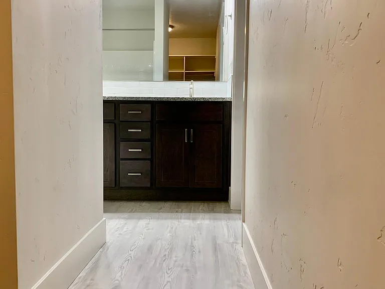 primary full bath with dual sinks