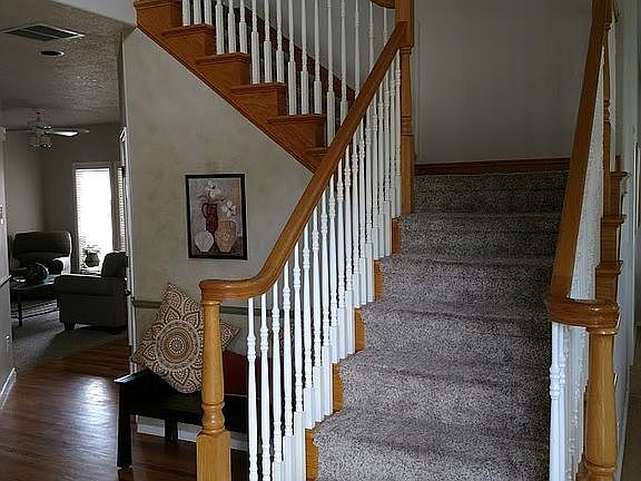 Open stairs in entry.