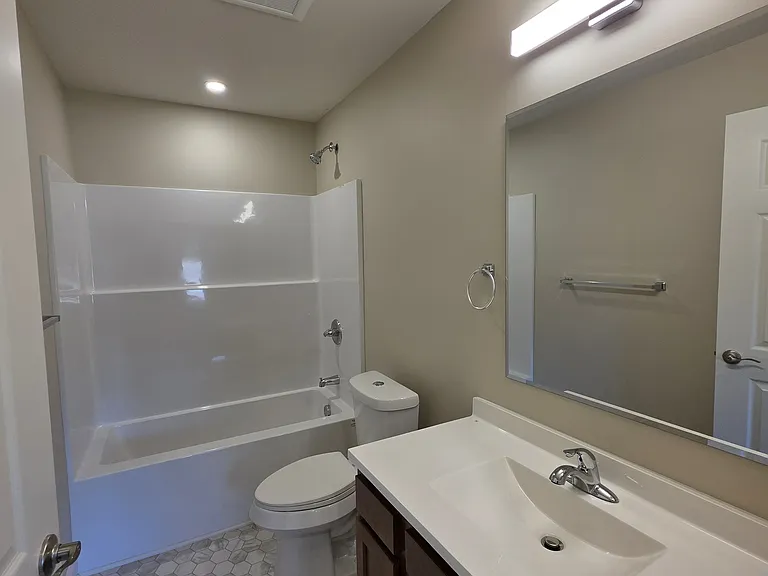 Bathroom attached to bedroom.