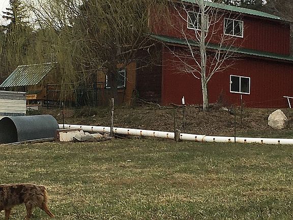 3 car garage/studio above