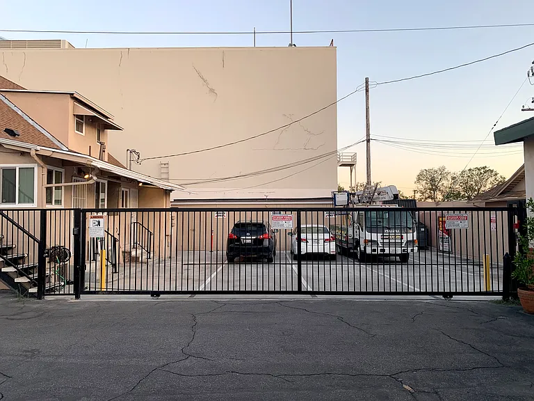 Security gate and parking space