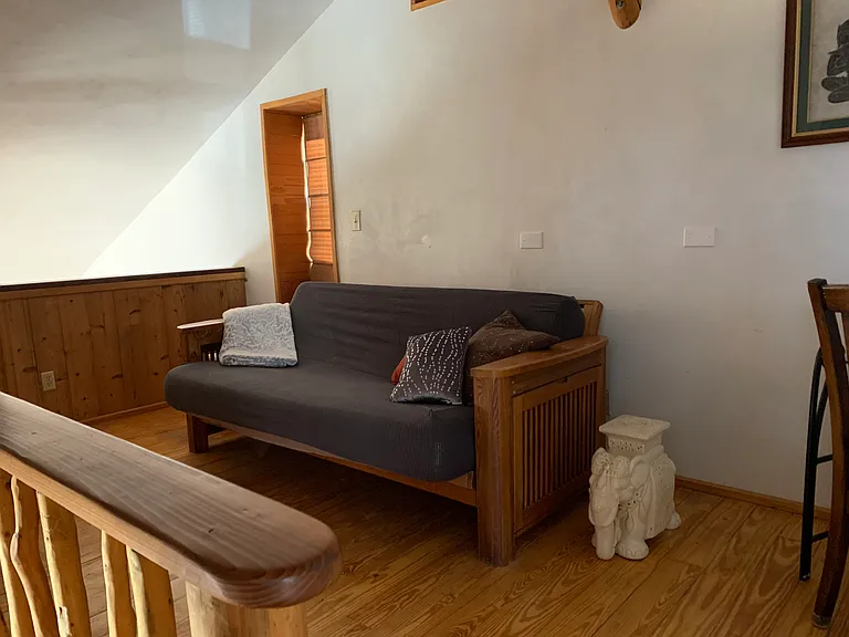 Upstairs loft with futon sofa