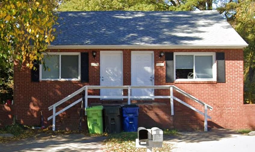 on the left side of the duplex, facing the property