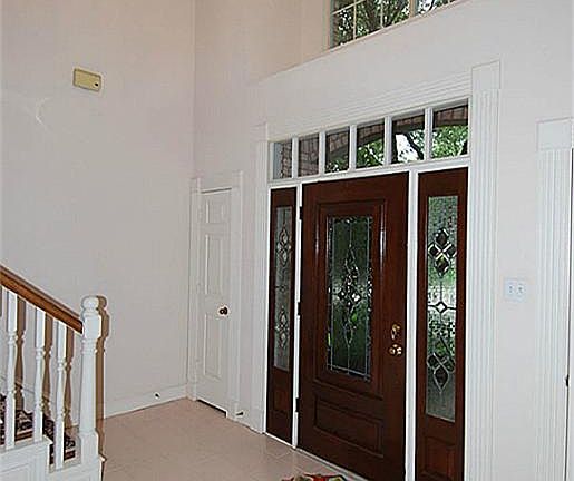 Two story entry is very open.