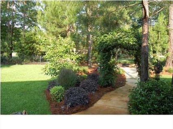 Walkway to fire pit.. Fenced