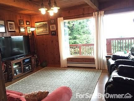 Living Room : Living room with picture windows and deck access