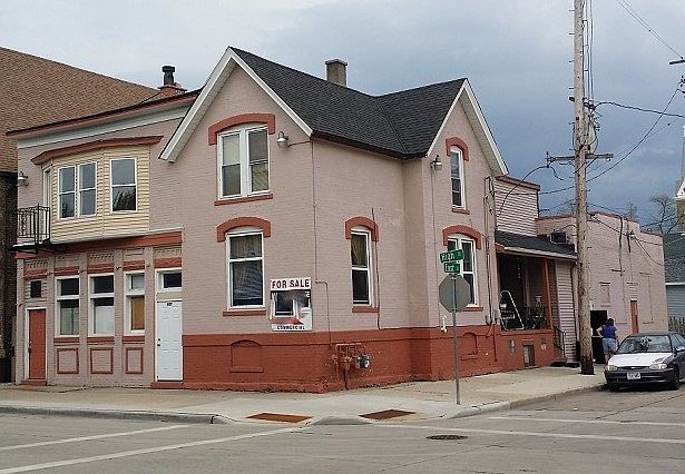 1 Store front 2 Apartments