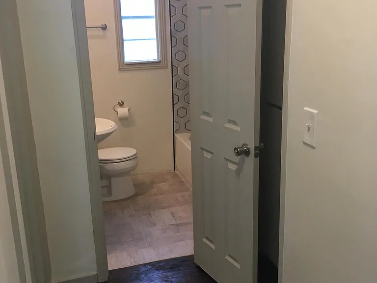 New bathroom just off hallway to the two bedrooms
