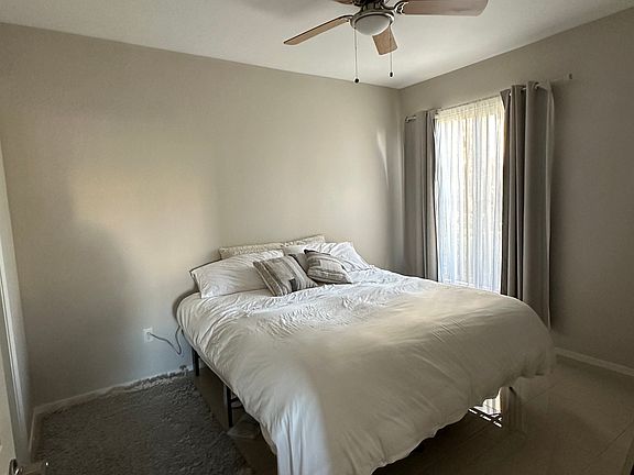 Master with en-suite bathroom and walk-in closet.