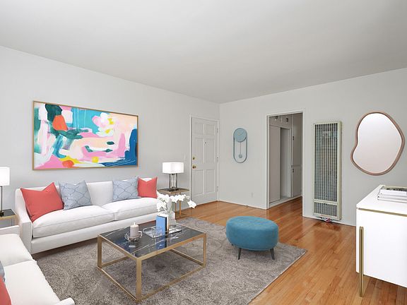 Spacious Living Room with Hardwood Flooring