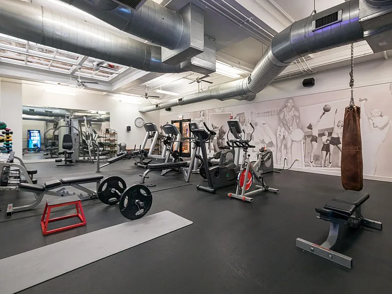 63 E Lake Apartments Fitness Center with Cardio Equipment