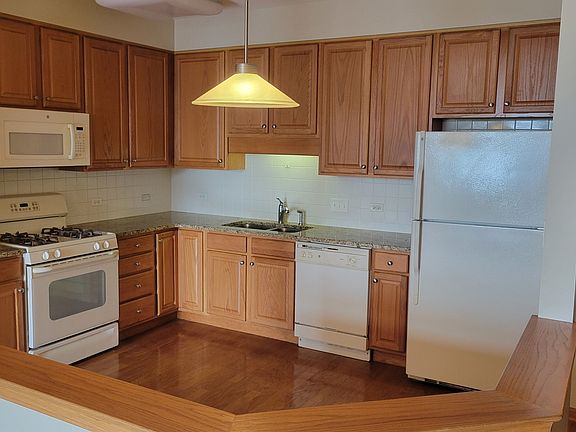 4th image of 5155 Madison St Unit 612