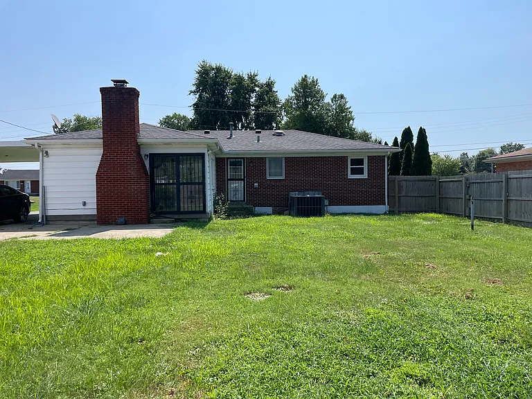 Large back yard with fence