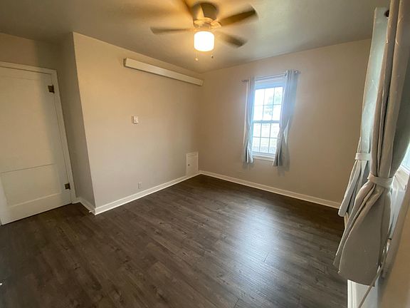 Spacious bedroom with radiant heat and new window A/C unit. Large closet with storage space.