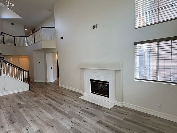 Living room with cathedral ceilings.