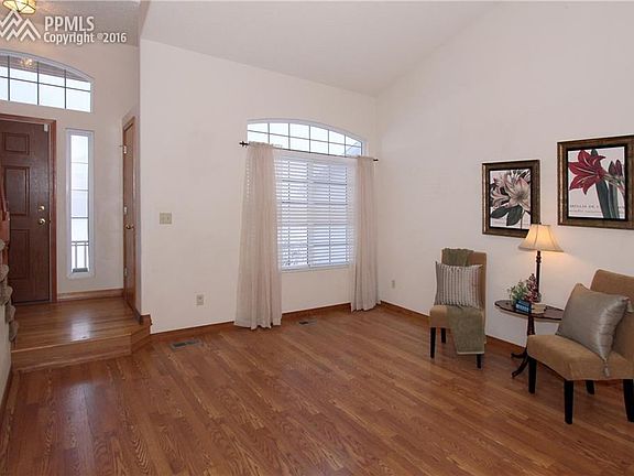Gorgeous pergo flooring, vaulted ceilings and large windows to allow the natural