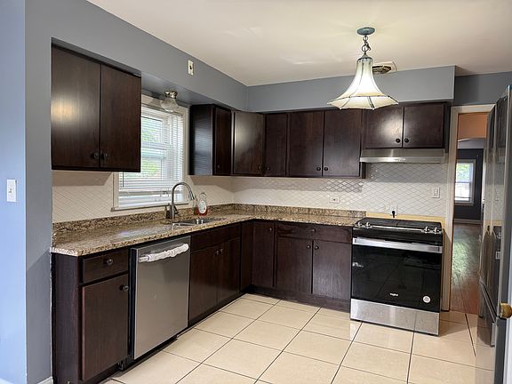 2nd image of 5901 N Merrimac Ave #1
