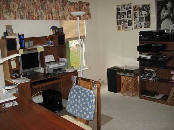 One of four bedrooms being used as office 