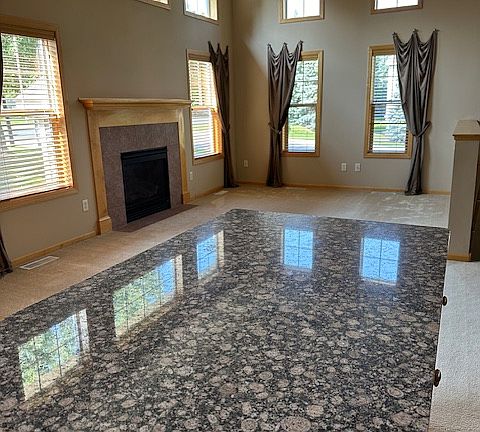 Cozy fireplace in living room.