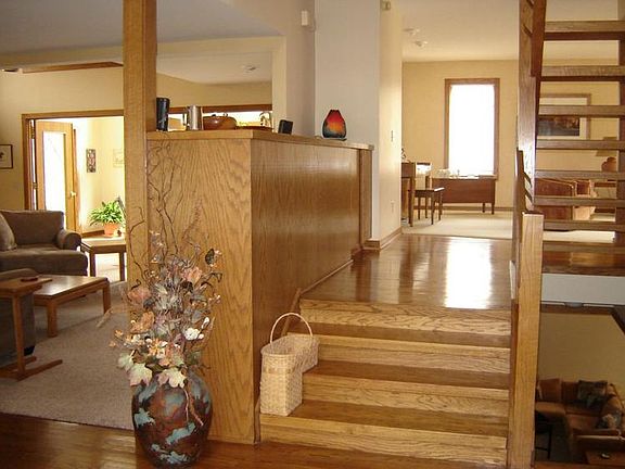 br /This is the view that awaits you when you walk in the front door..............many, many windows make this home very bright and light!br /br /The woodwork is striking when you begin walking through the house.br /br /