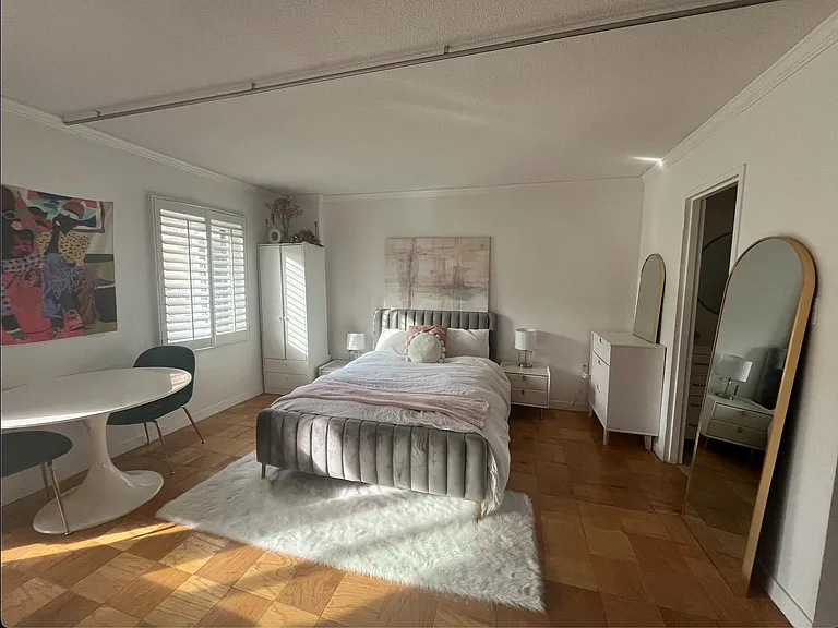 Bedroom with wardrobe and dresser