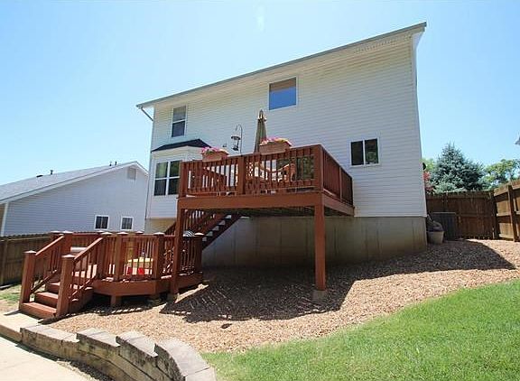 Dual decks overlooking yard and pool!