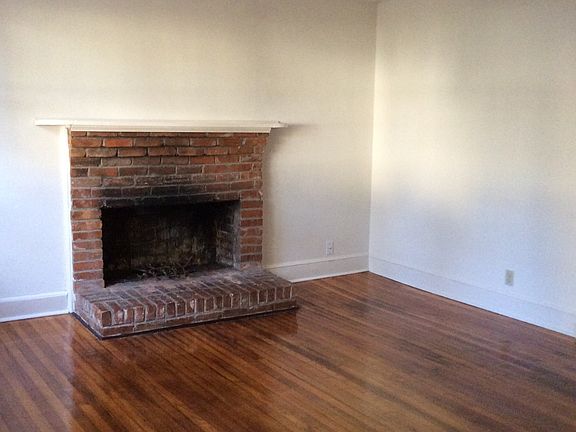 Living Room w/ Wood burning fireplace