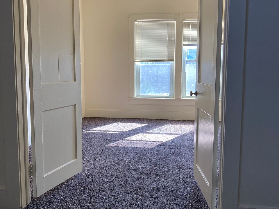 View from the living room into bedroom 1.