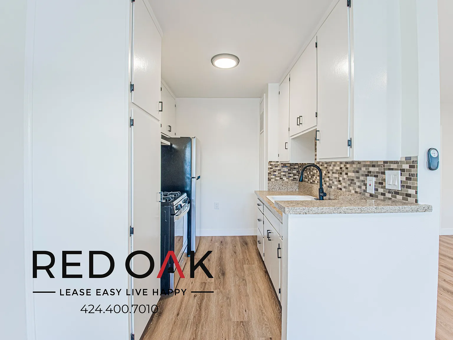 Beautiful One Bedroom with Updated Kitchen, On-Site Laundry, and Included Parking ~ In Sunset Park! — Photo 2
