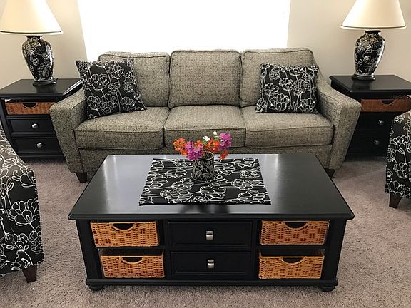 LR sofa and table showing one of the unique artist made piec