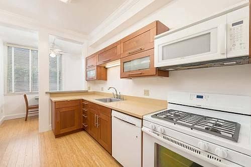 Partial view of kitchen, looking towards dining.