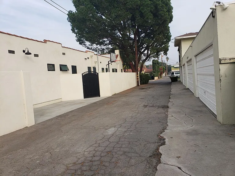 This is a view of the opposite way looking up/down the alley way. Nicely kept up by residents