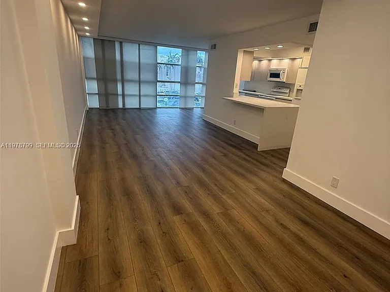851 Three Islands Blvd #209 — Photo 1
