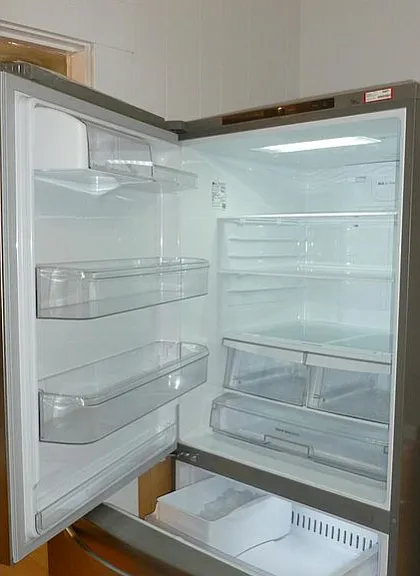 New stainless refrigerator with ice maker