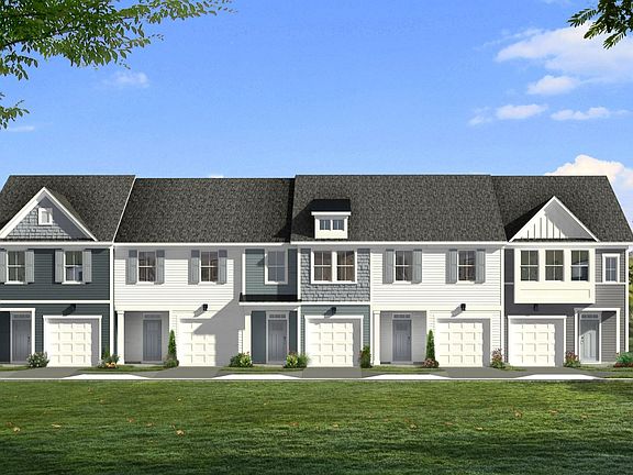 new townhome exterior one car garage Egret plan by DRB Homes in Foxbank Moncks Corner, SC