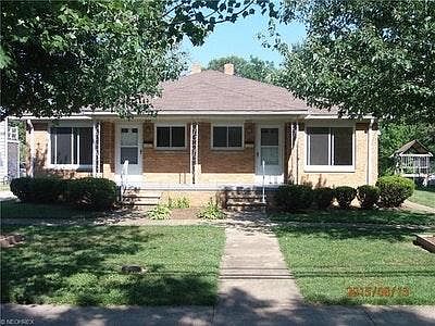 Front of duplex, right side is 855 Douglas