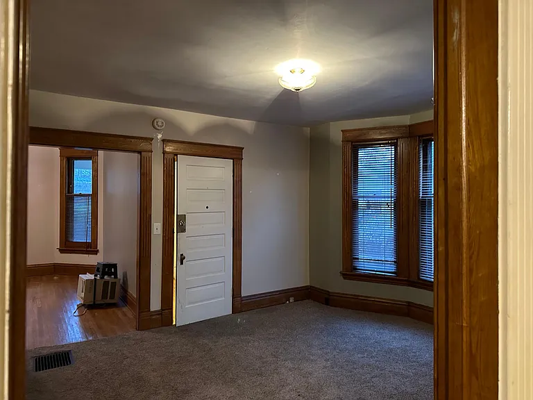 Living Room with view into Front Sitting Room