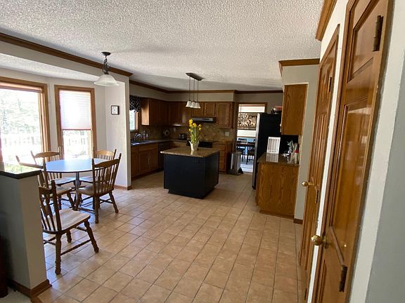 Two doors a_o the right are basement stairs and pantry