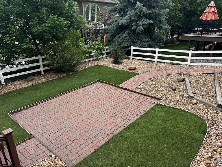 patio in backyard off of deck
