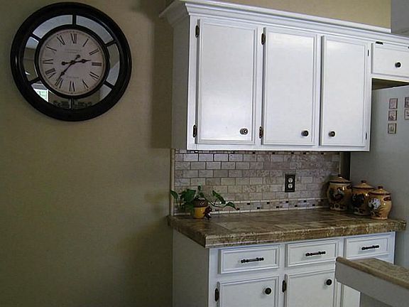 Kitchen has plenty of counter space and cabinetry