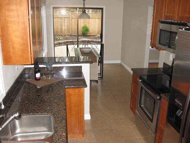 Remodel Stainless appliances solid wood cabinets