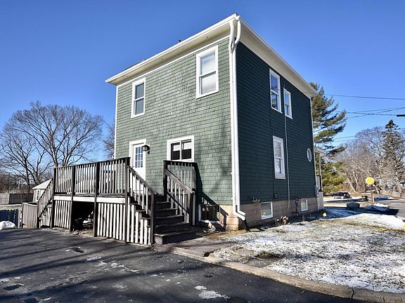 Side of home with large porch