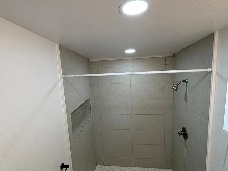 Floor to ceiling tiled Shower