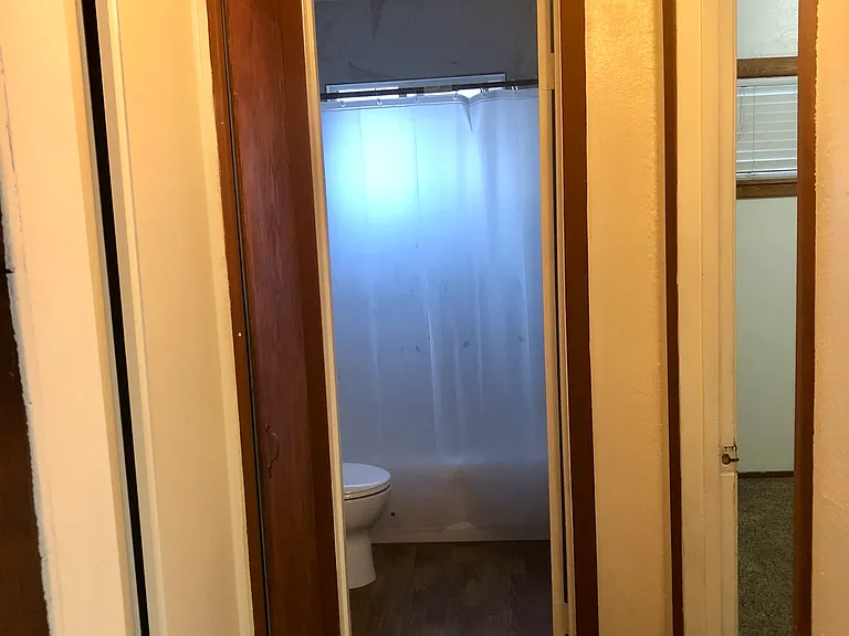 Hallway from living room / kitchen to bedroom and bathroom. Excellent layout for maximum privacy!