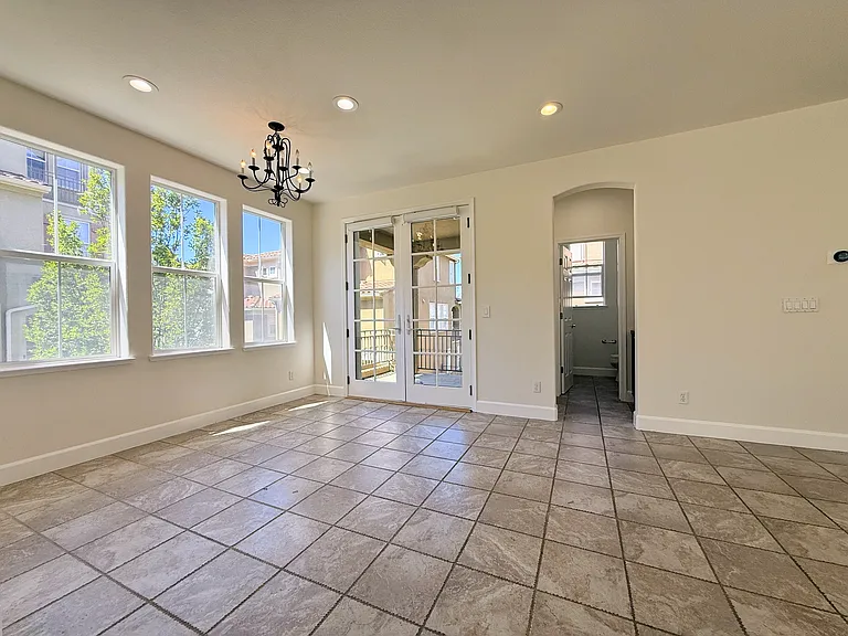 Dining Room w. French Doors to Balcony