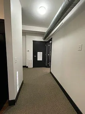 Unit hallway at 3 Points Loft.