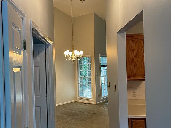 view from inside front door toward dining/living area