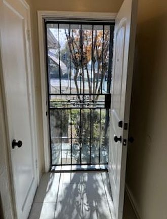 Entry, with security screen and new front door.